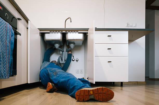 Professional Drain Cleaning technician working in Belleville, KS
